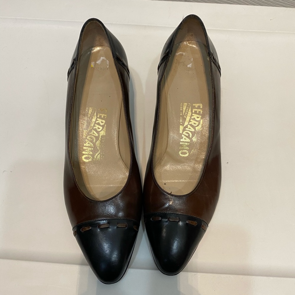 Brown and black Ferragamo heals